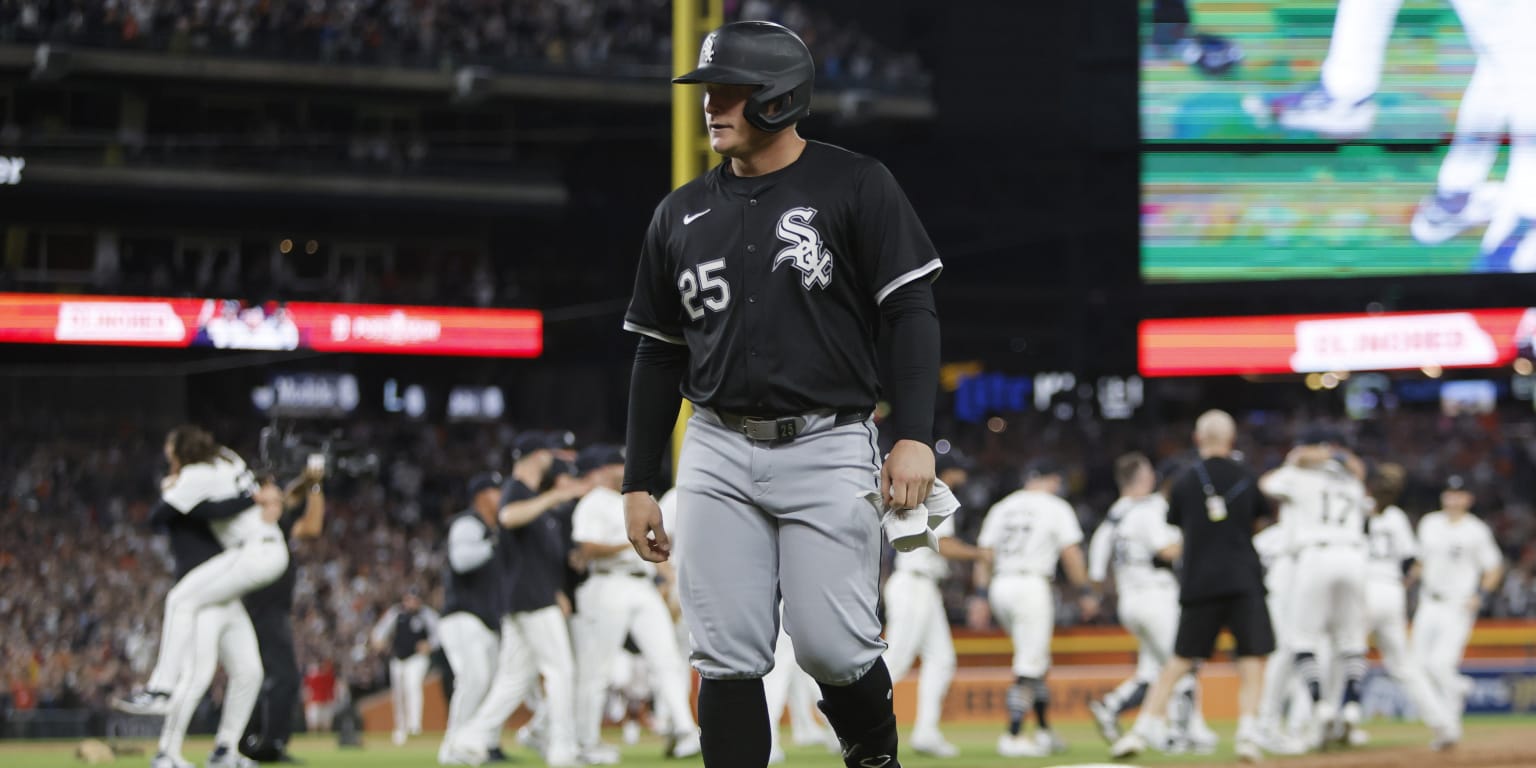 A Chicago White Sox player watches Detroit celebrate on the field during the record-setting 2024 season