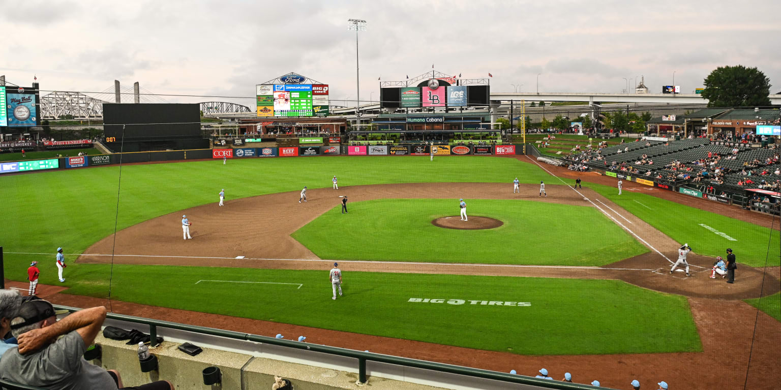Louisville Bats players competing on the field at Louisville Slugger Field